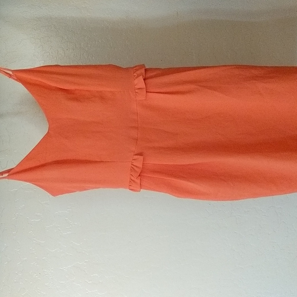 Beautiful color dress size xs bust size is 16 length is 17 from waist line front